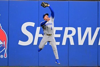 Isaac Collins Leaves Game After Tumbling Over Wall