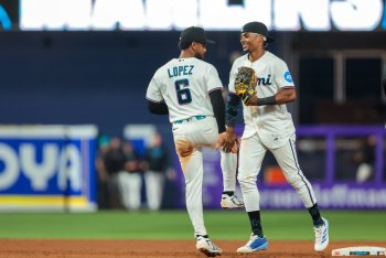 Lopez makes history as Marlins soar to ten games over